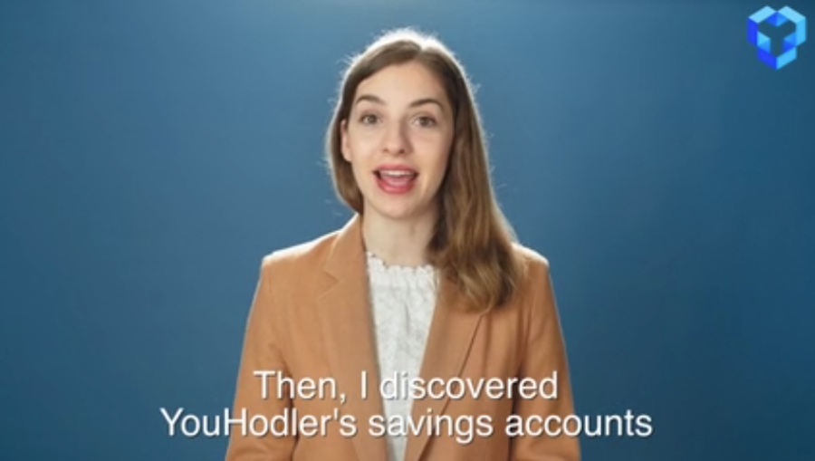 A women named Olivia with brown hair is on camera discussing her experience with YouHodler savings accounts